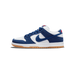 Side view of a navy blue and white Nike SB Dunk Low sneaker with a gum rubber outsole and red text on the heel tab, toe pointing left.