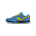 Side view of a blue Nike SB Dunk Low with a yellow Swoosh, yellow laces, black outline stitching, and a black midsole with translucent blue outsole, toe pointing left.