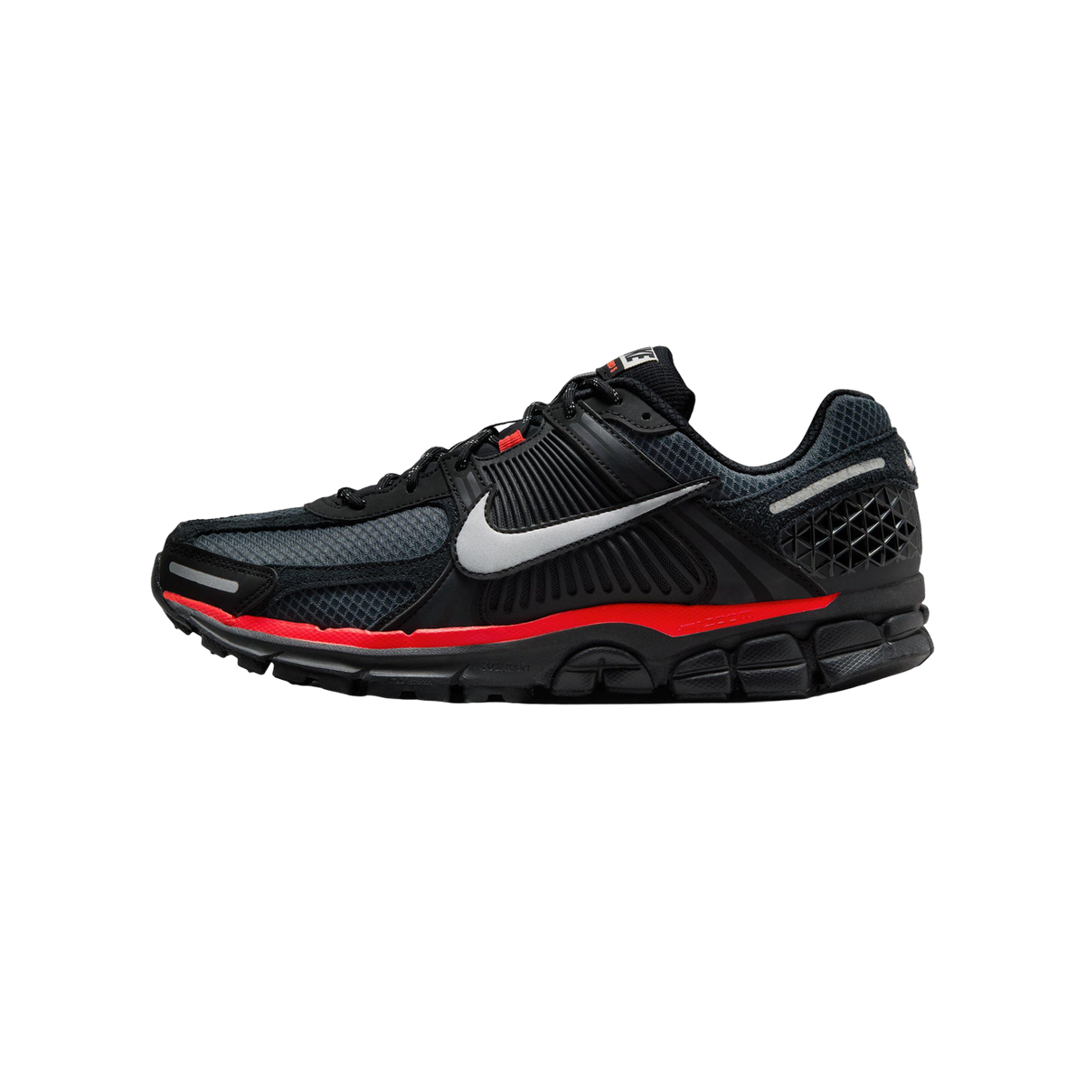 Side view of a black Nike Zoom Vomero running shoe with a red midsole stripe and silver reflective swoosh.
