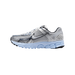 Side view of a silver and white Nike Zoom Vomero 5 running shoe with a light blue midsole and dark navy accents, toe pointing left.