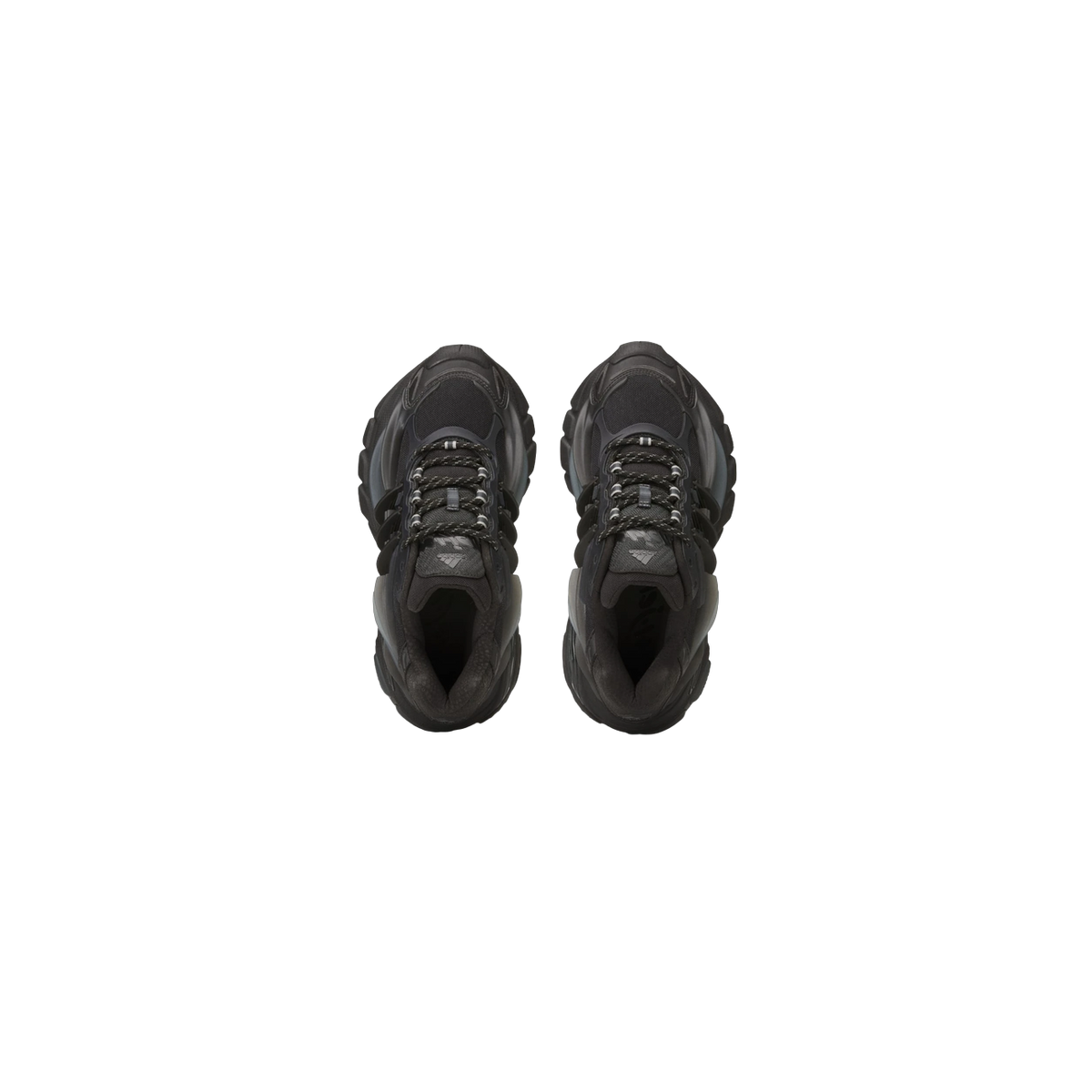 Top-down view of a pair of black Adidas Adistar Jellyfish sneakers showing chunky lugged soles, black laces, and Adidas branding on the tongue.