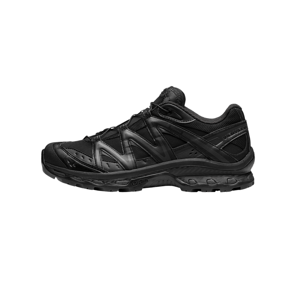 Side view of a black Salomon XT-Quest Adv trail shoe with quicklace toggle, layered synthetic overlays, and a chunky black Contagrip outsole.