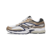 Right shoe lateral view of a Saucony ProGrid Omni 9 running shoe in white mesh with gold overlays, navy accents, black heel panel, and a white midsole with navy outsole details.