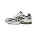 Side view of a Saucony OG ProGrid Omni 9 sneaker in white, silver, and dark olive with mesh panels and an olive-white midsole.