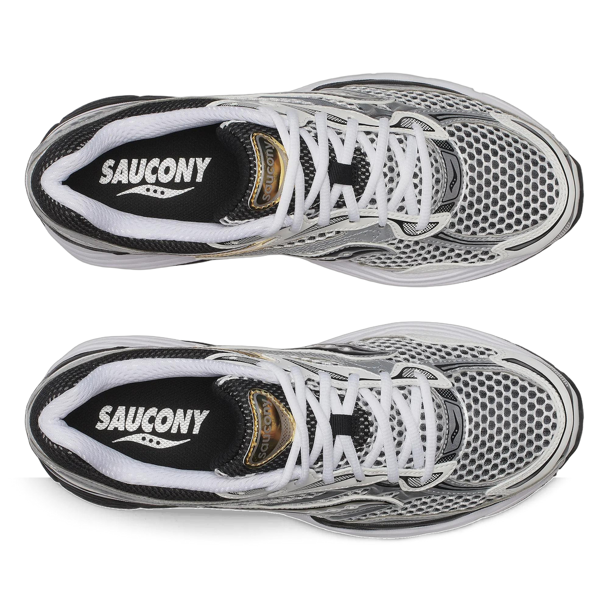 Top-down view of a pair of Saucony ProGrid Omni 9 sneakers in white and black mesh with silver overlays, showing white laces and Saucony branding on the black tongue interior.