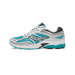 Lateral view of a Saucony OG ProGrid Omni 9 running shoe in turquoise, white, and black with silver accents and a teal outsole.