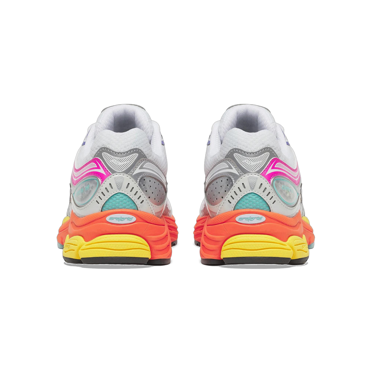 Rear view of a pair of white Saucony ProGrid Omni 9 sneakers with pink heel accents, teal mesh panels, and orange and yellow midsoles labeled ProGrid.