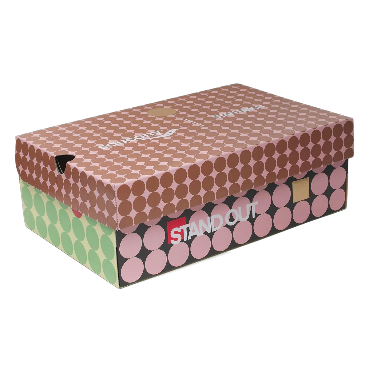 Saucony shoe box with a pink and brown polka-dot pattern, Saucony logo, and 'Stand Out' text on the side.