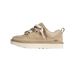 Outside view of a tan suede UGG Lowmel Lo sneaker with thick cream laces, a chunky lugged sole, and a small UGG logo embossed near the heel.