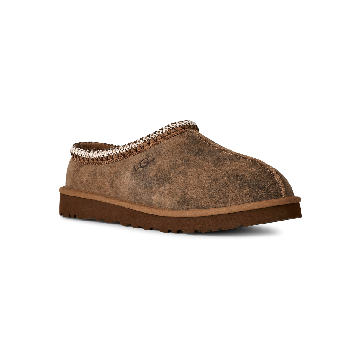 Angled side view of a brown suede UGG Tasman slipper with braided trim and embroidered logo, toe pointing left.