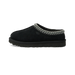 Side view of a black UGG Tasman II slip-on slipper with embroidered trim around the collar and a black rubber sole.