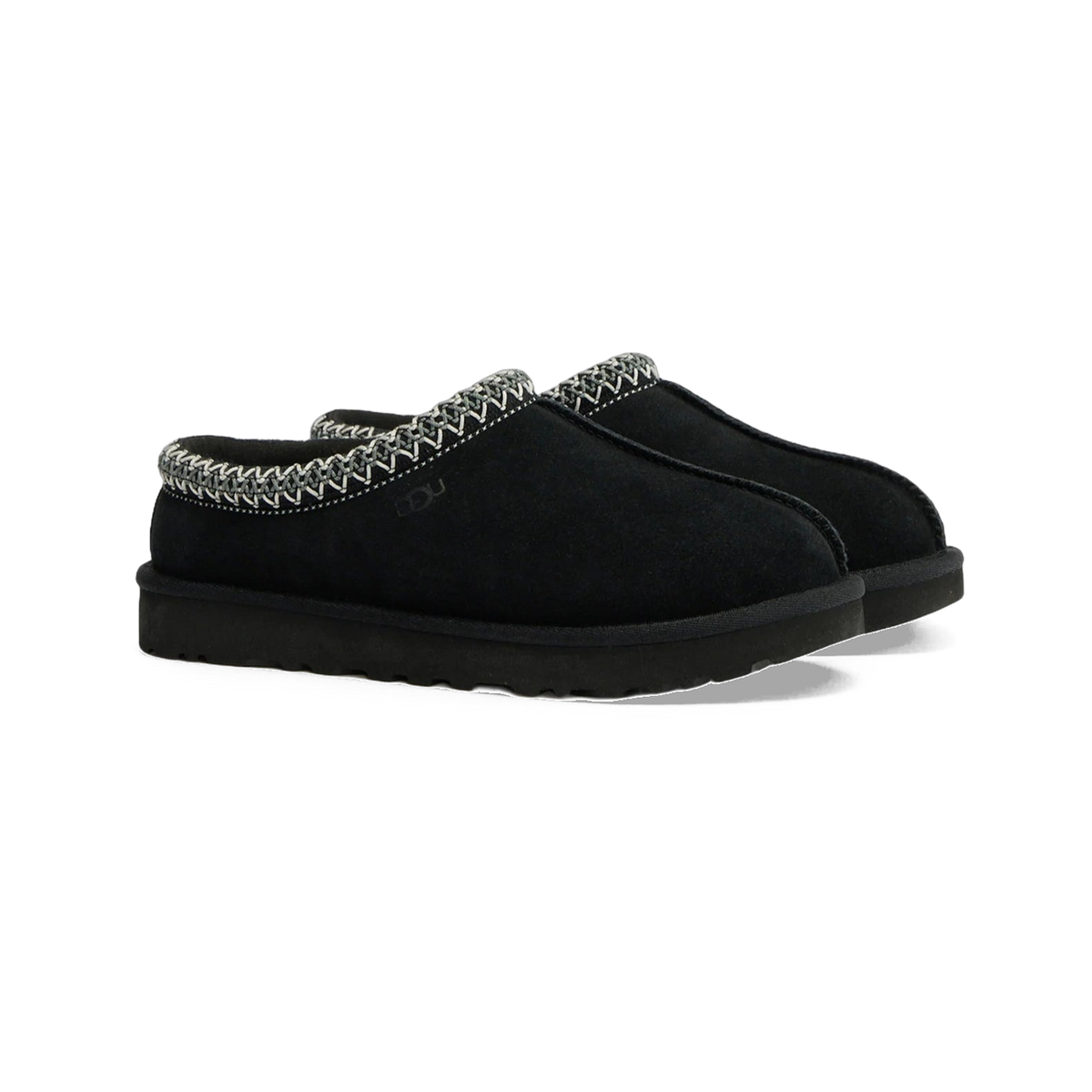 Pair of black UGG Tasman II suede slip-on slippers with embroidered trim around the collar, shown at a three-quarter angle.