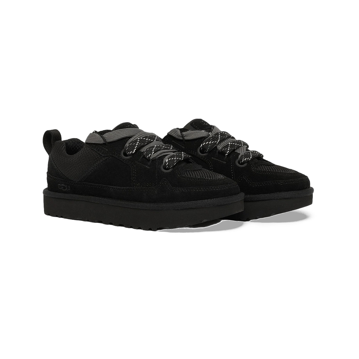 Pair of black UGG Lowmel Lo sneakers with grey patterned laces, thick platform soles, and suede and mesh panels, shown at a front angle.