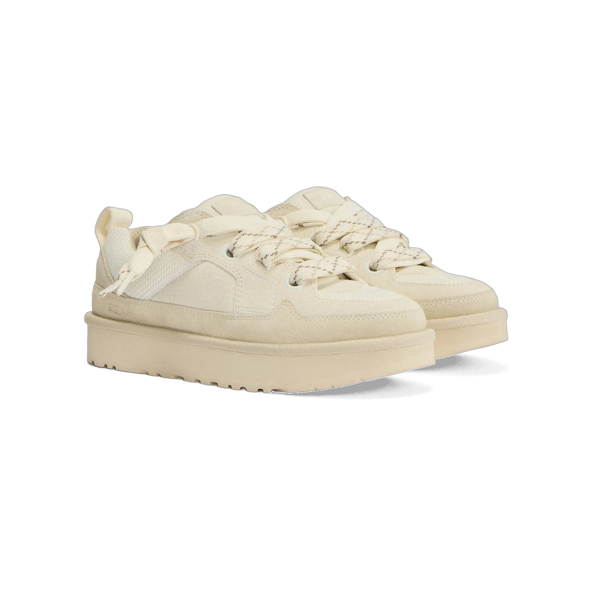 Pair of beige suede UGG Lowmel Lo sneakers with oversized fabric laces and thick platform soles, shown from a front angled view.