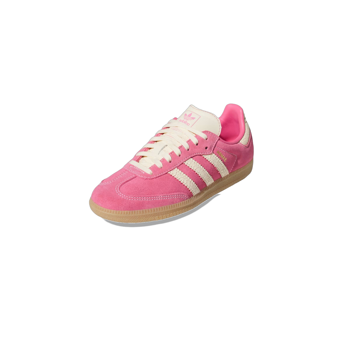 Angled front view of a pink suede Adidas Samba sneaker with cream cracked-texture stripes, gum sole, and cream heel tab with pink trefoil logo.