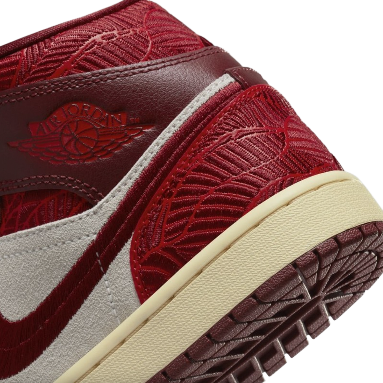 Air Jordan 1 Mid SE Tiki Leaf sneaker with tropical leaf graphics and premium leather upper