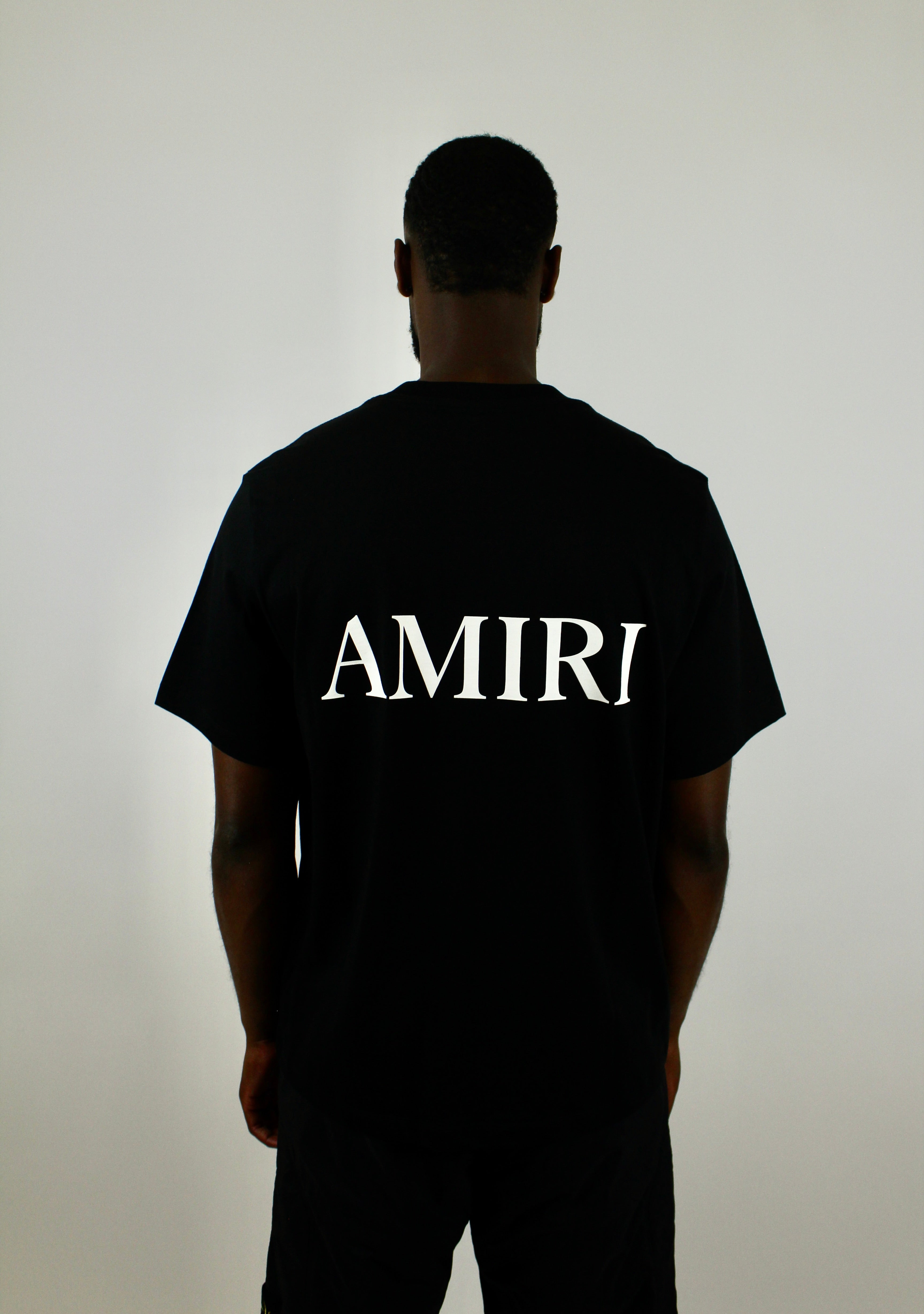 Amiri Core Logo Tee 'Black' – sleek black T-shirt with the signature Amiri core logo, premium soft cotton fabric, and minimalist style, ideal for everyday casual and streetwear looks.