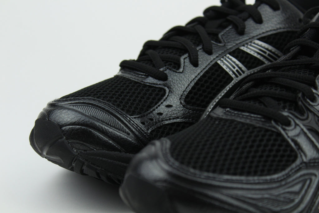 ASICS GEL-KAYANO 14 'Black Pure Silver' – high-performance running shoes with a sleek black and silver design, GEL cushioning for maximum comfort, and durable construction, ideal for athletes and casual wear.