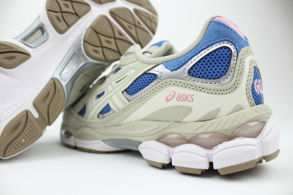 ASICS GEL-NYC sneakers in 'Polar Night & Cream' colorway, sleek running shoes with navy blue and cream accents, ideal for sporty and casual outfits