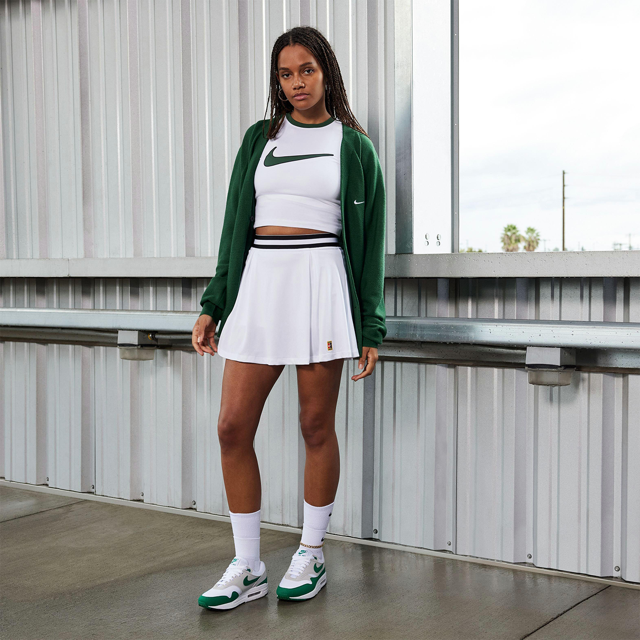 Nike Air Max 1 87 Wmns Malachite sneaker with white mesh upper and green accents available the attic
