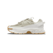 Lateral view of a light stone and sail Nike Zoom Vomero 5 sneaker with a chunky white midsole and gum rubber outsole.