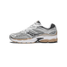 Side view of a Saucony OG ProGrid Omni 9 running shoe in white and silver mesh with black overlays and a brown midsole and outsole