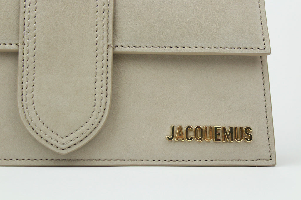 Jacquemus Le Grand Bambino 'Dark Beige' with smooth leather and clean structure. A neutral staple that balances everyday wear with quiet sophistication.