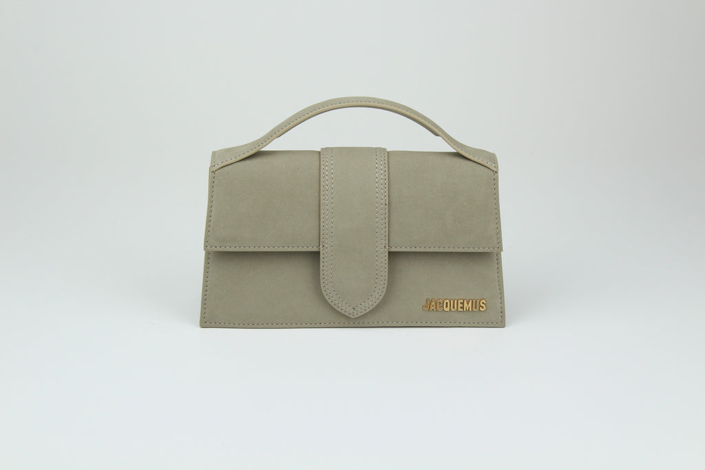 Jacquemus Le Grand Bambino 'Dark Beige' with smooth leather and clean structure. A neutral staple that balances everyday wear with quiet sophistication.