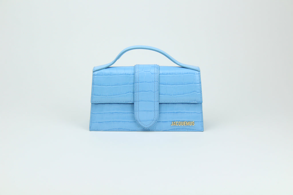 Jacquemus Le Grand Bambino 'Light Blue Croco' blends croc-embossed leather with fresh color and clean design. A structured, elegant accessory for standout everyday wear.