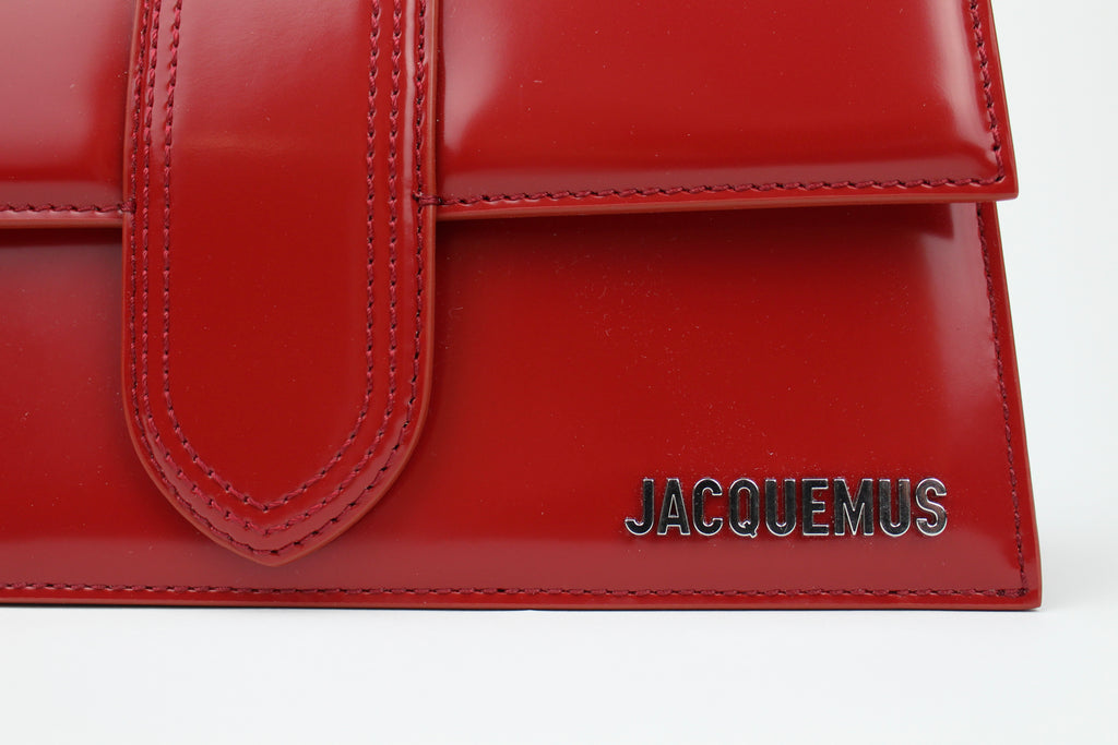 Jacquemus Le Grand Bambino 'Red' with bold leather, clean structure, and gold logo detail. A sleek, versatile statement bag for everyday elevated looks.