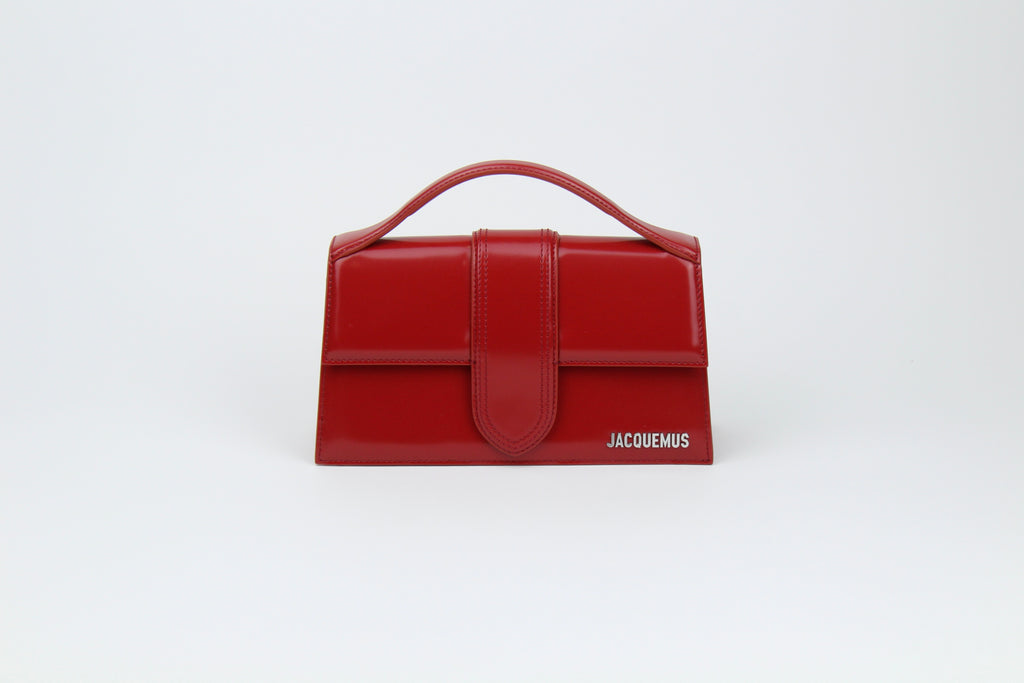 Jacquemus Le Grand Bambino 'Red' with bold leather, clean structure, and gold logo detail. A sleek, versatile statement bag for everyday elevated looks.