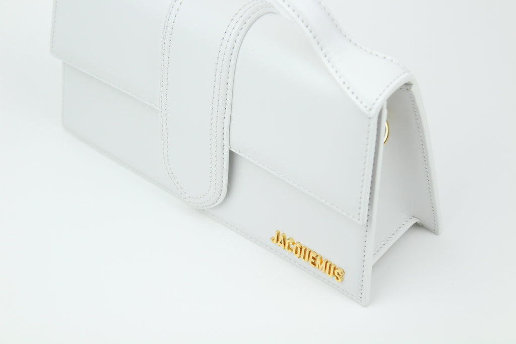 Shop the Jacquemus Le Grand Bambino 'White' – a premium leather handbag with a structured silhouette, spacious interior, and versatile design for timeless minimalist elegance.
