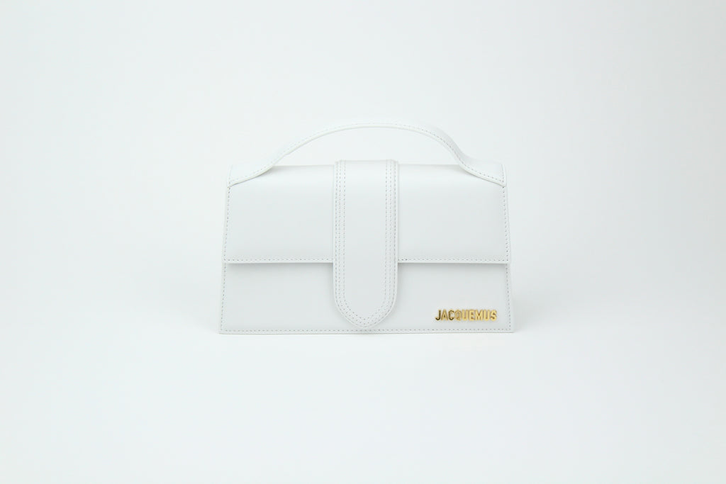Shop the Jacquemus Le Grand Bambino 'White' – a premium leather handbag with a structured silhouette, spacious interior, and versatile design for timeless minimalist elegance.
