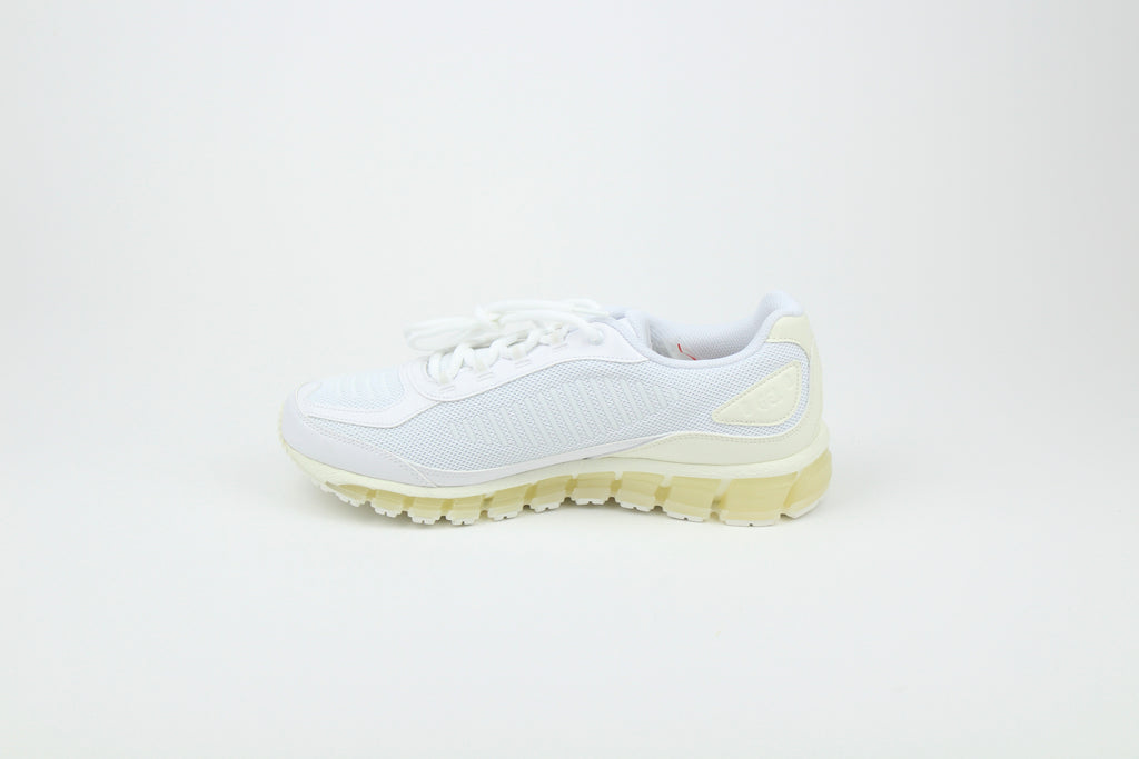 JJJJound x ASICS GEL-QUANTUM 360 White sneakers side view, minimalist design, white mesh and synthetic upper, collaborative high-performance footwear, stylish athletic shoe