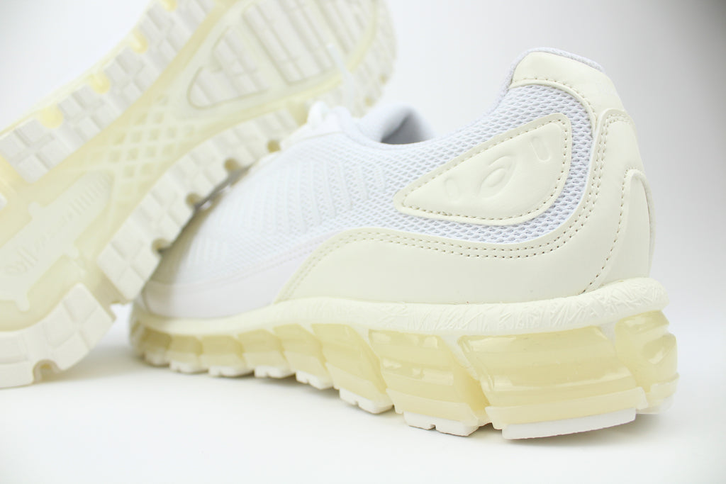 JJJJound x ASICS GEL-QUANTUM 360 White sneakers side view, minimalist design, white mesh and synthetic upper, collaborative high-performance footwear, stylish athletic shoe