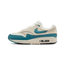 Nike Air Max 1 Essential Soft Pearl Smokey Blue sneaker with mesh and leather upper blue accents and classic Air Max cushioning available at The Attic