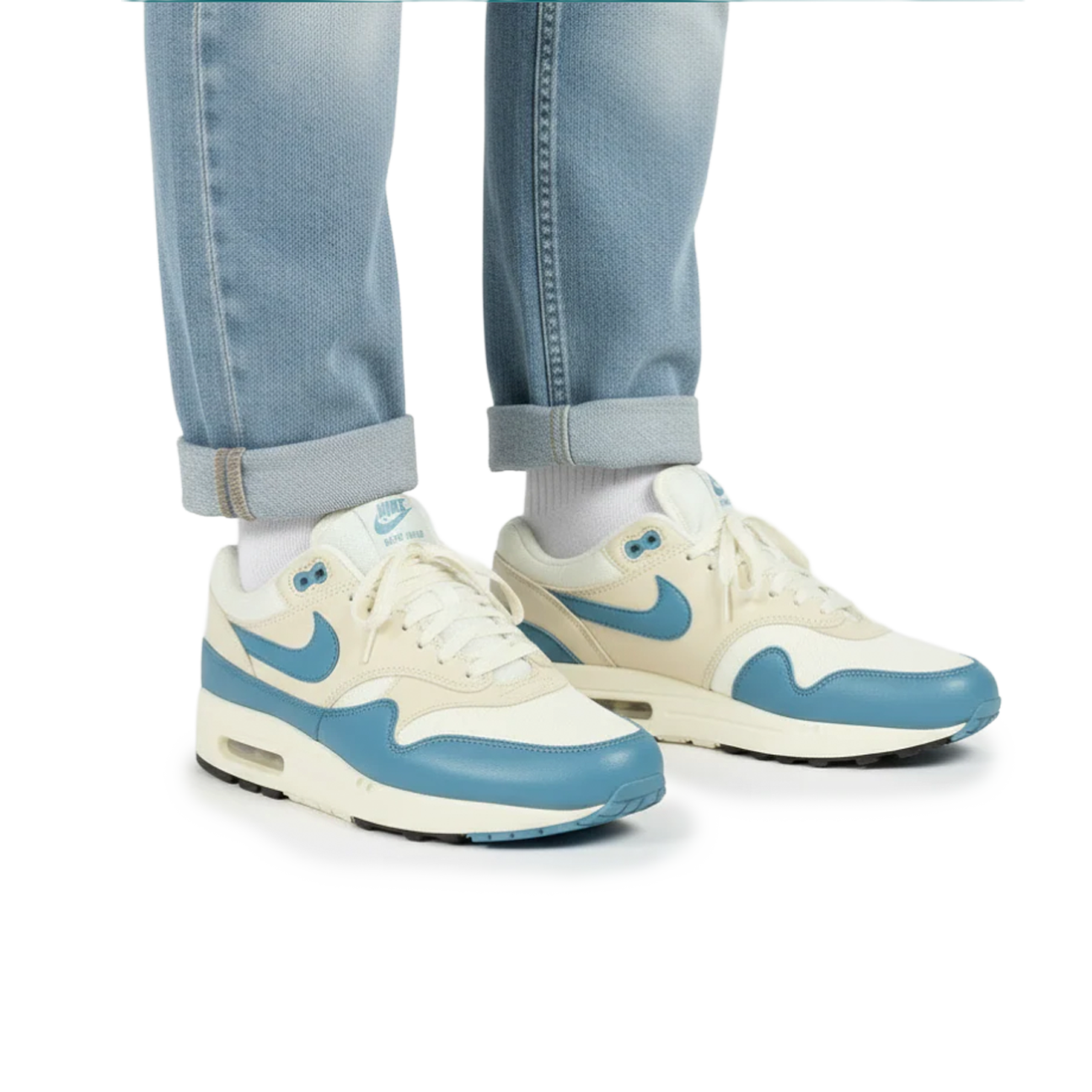 Nike Air Max 1 Essential Soft Pearl Smokey Blue sneaker with mesh and leather upper blue accents and classic Air Max cushioning available at The Attic
