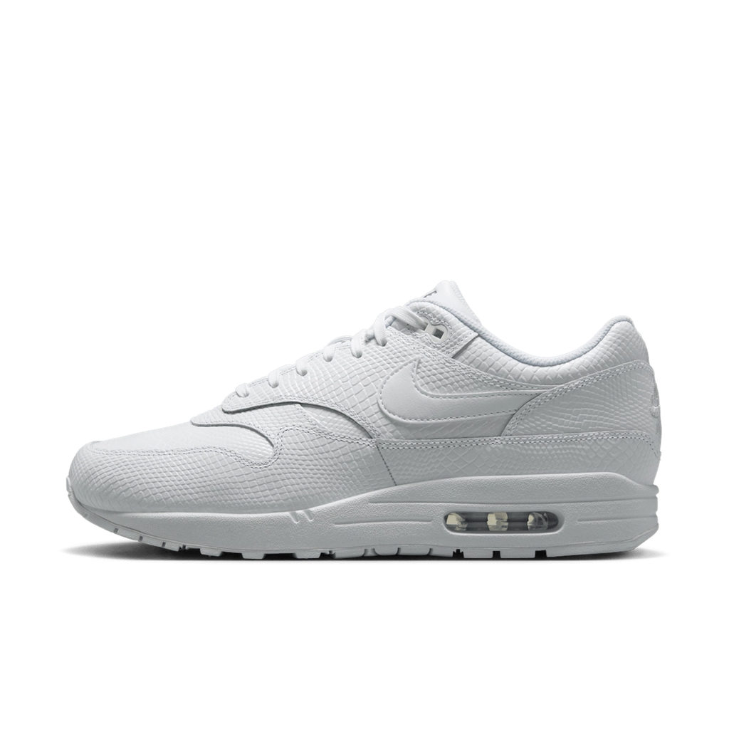 Nike Air Max 1 PRM Snakeskin sneakers in 'Triple White' colorway, premium white athletic shoes with snakeskin detailing, ideal for casual and stylish outfits.