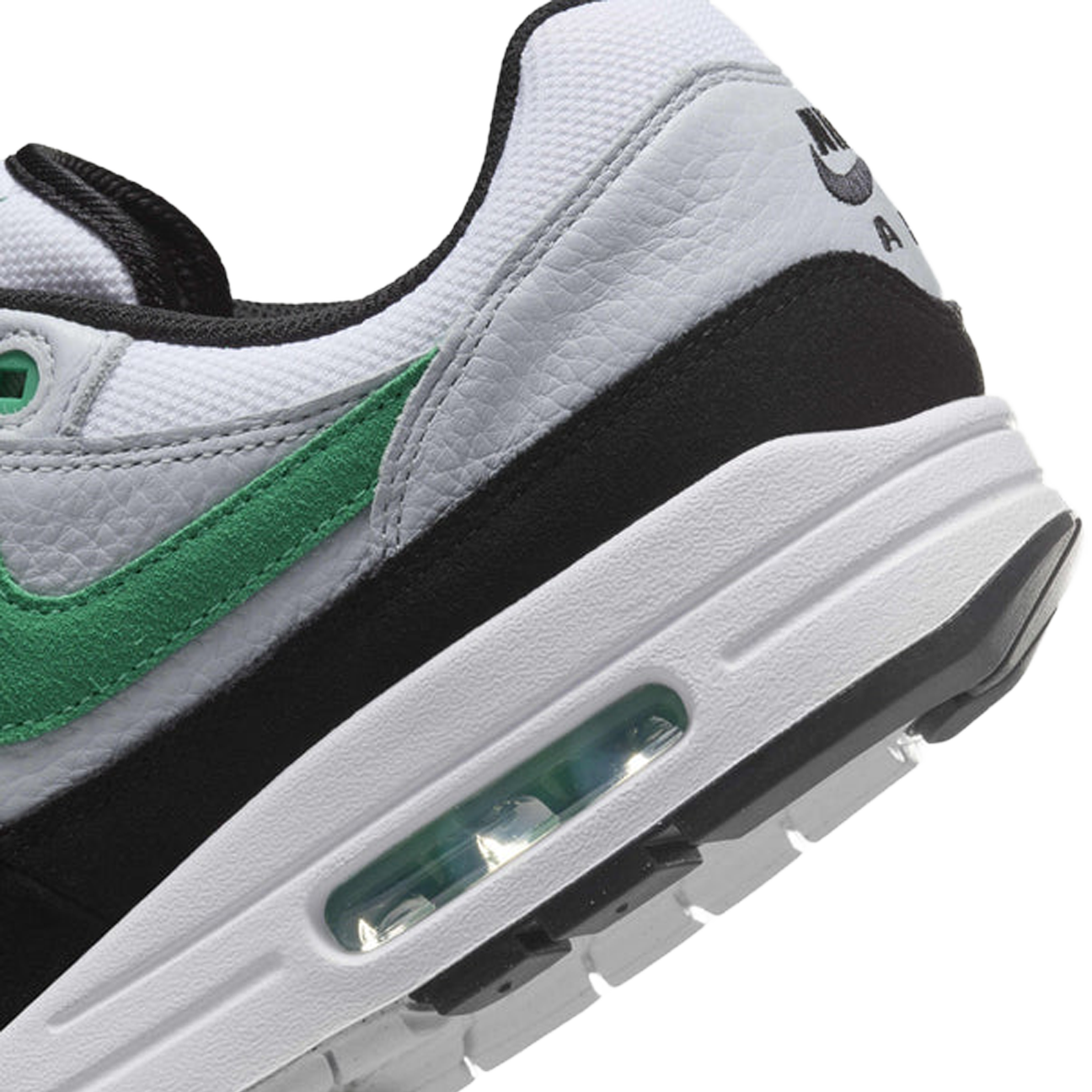 Nike Air Max 1 White Black Stadium Green sneaker with white mesh upper black detailing and green accents
