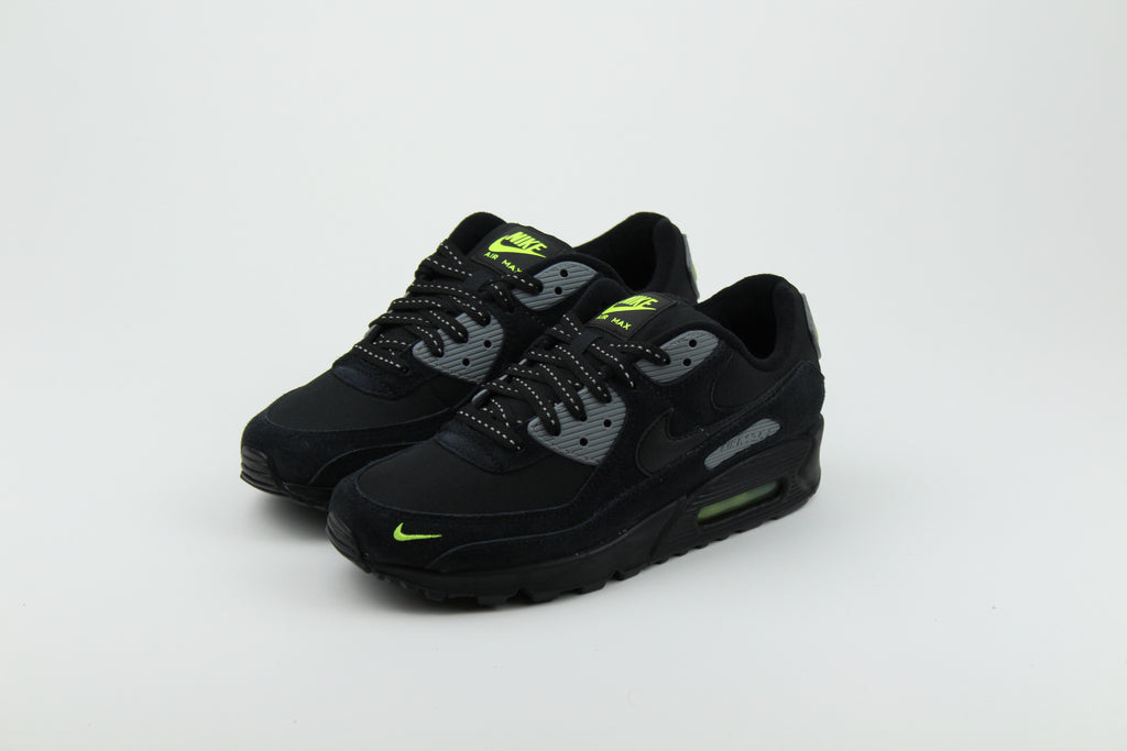 Nike Air Max 90 Black Volt sneakers with black and vibrant green colorway, featuring iconic air cushioning, breathable mesh, and durable design for performance and style