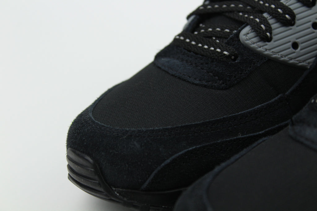 Nike Air Max 90 Black Volt sneakers with black and vibrant green colorway, featuring iconic air cushioning, breathable mesh, and durable design for performance and style