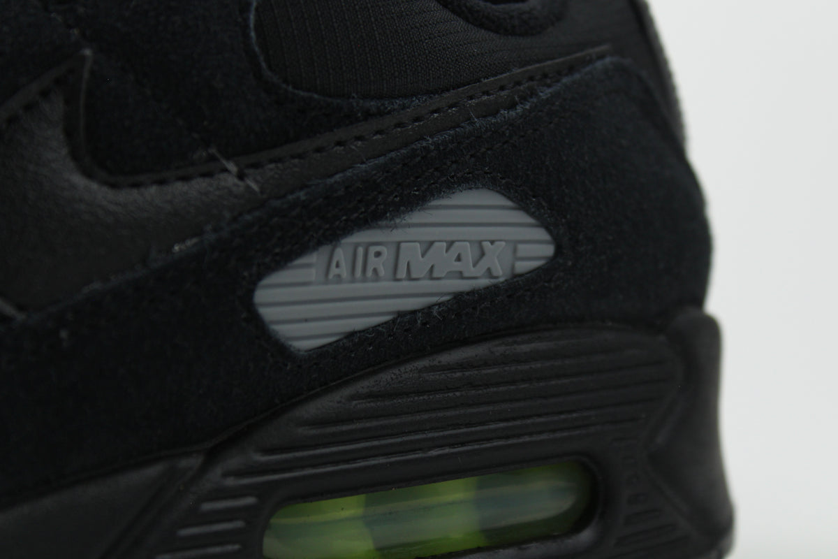 Nike Air Max 90 Black Volt sneakers with black and vibrant green colorway, featuring iconic air cushioning, breathable mesh, and durable design for performance and style