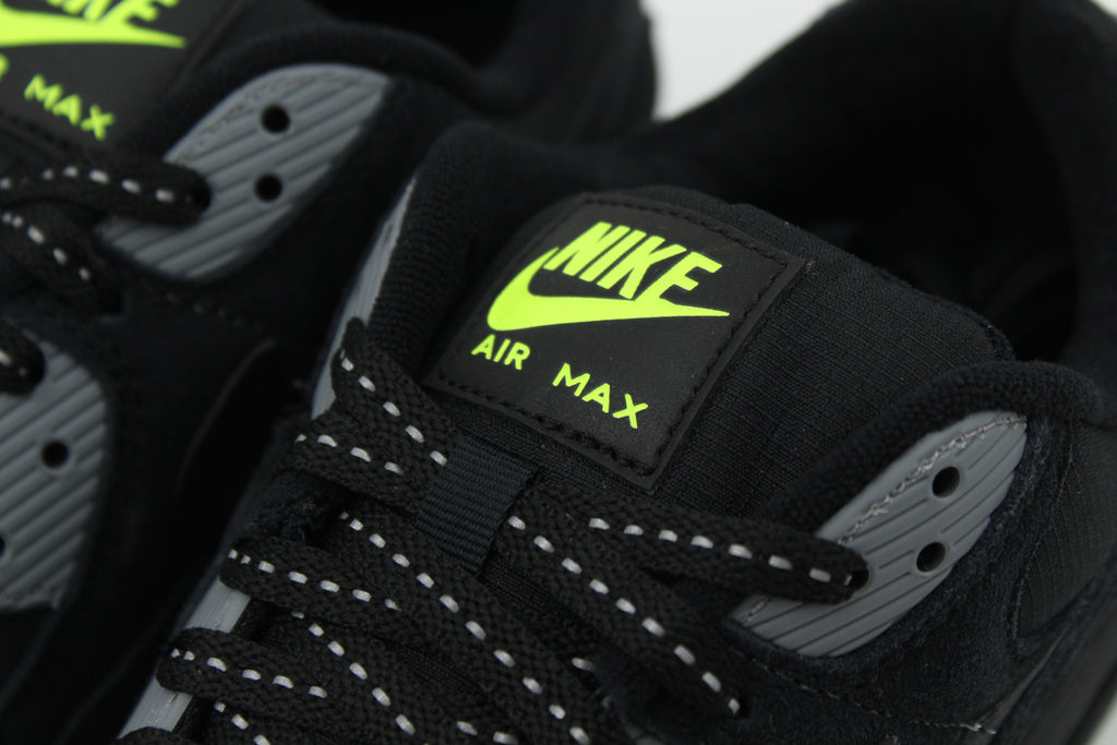 Nike Air Max 90 Black Volt sneakers with black and vibrant green colorway, featuring iconic air cushioning, breathable mesh, and durable design for performance and style