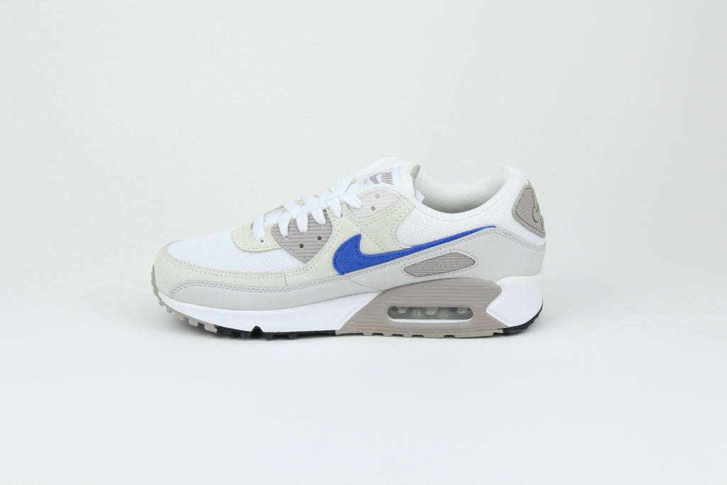Nike Air Max 90 sneakers in 'Grey Racer Blue' colorway, stylish athletic shoes with grey and blue accents, perfect for casual and sportswear.