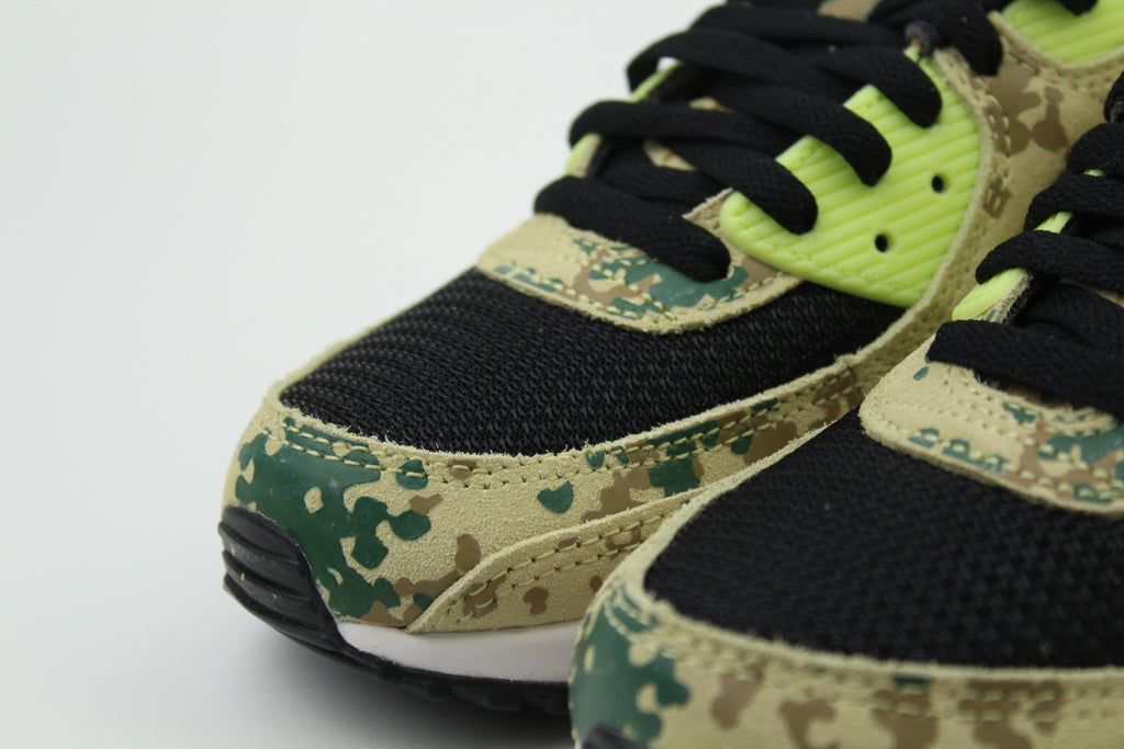 Nike Air Max 90 'Light Lemon Twist' (Camo Pack) – vibrant sneakers with a fresh lemon color, camo details, innovative Nike Air cushioning, and durable design, ideal for casual and athletic wear.
