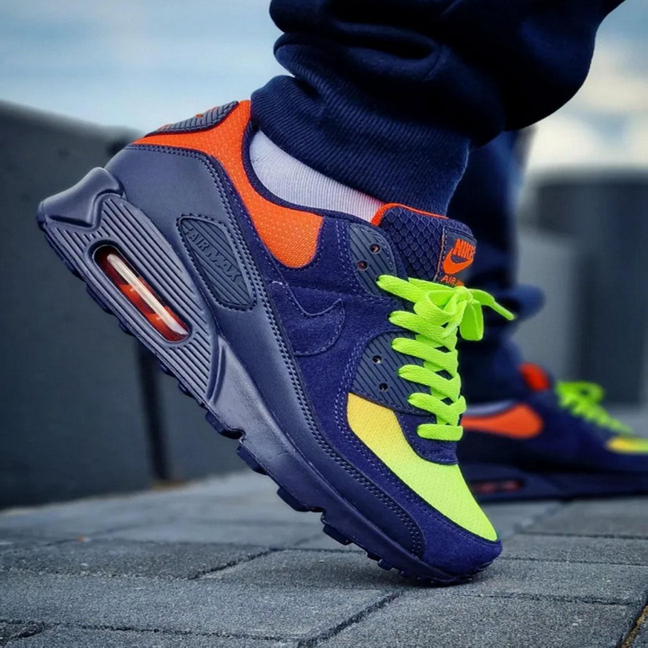 Nike Air Max 90 LTR Lemon Venom Blackened Blue GS sneaker with leather upper bold yellow colourway and visible Air cushioning