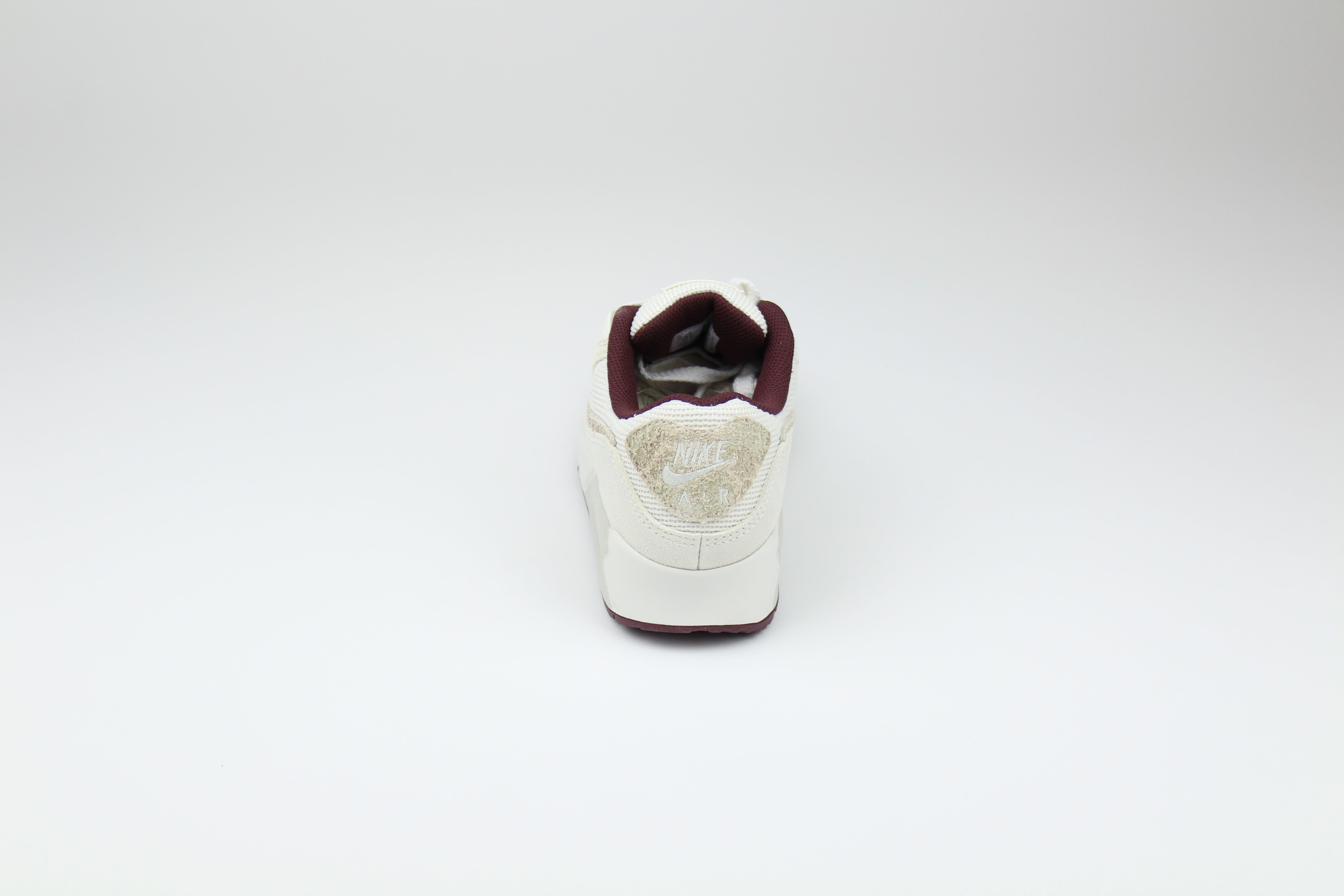 Nike Air Max 90 'Phantom & Burgundy Crush' – stylish sneakers featuring a sleek combination of phantom and burgundy crush colours, Air Max cushioning for comfort, and premium construction, ideal for casual and streetwear outfits.