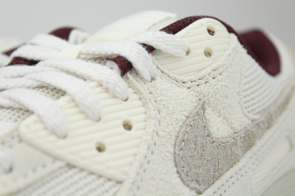 Nike Air Max 90 'Phantom & Burgundy Crush' – stylish sneakers featuring a sleek combination of phantom and burgundy crush colours, Air Max cushioning for comfort, and premium construction, ideal for casual and streetwear outfits.