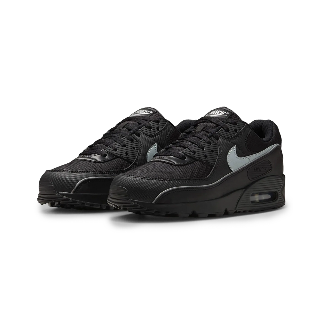Nike Air Max 90 Premium Black Reflective sneaker with black upper reflective details and classic Air Max cushioning available at The Attic