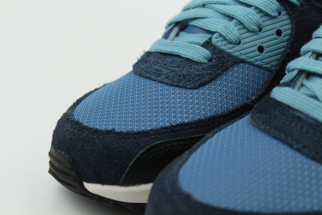 Nike Air Max 90 Premium 'Armory Navy' features suede and leather layers in deep navy tones. A premium twist on the classic silhouette for a clean, everyday streetwear fit.